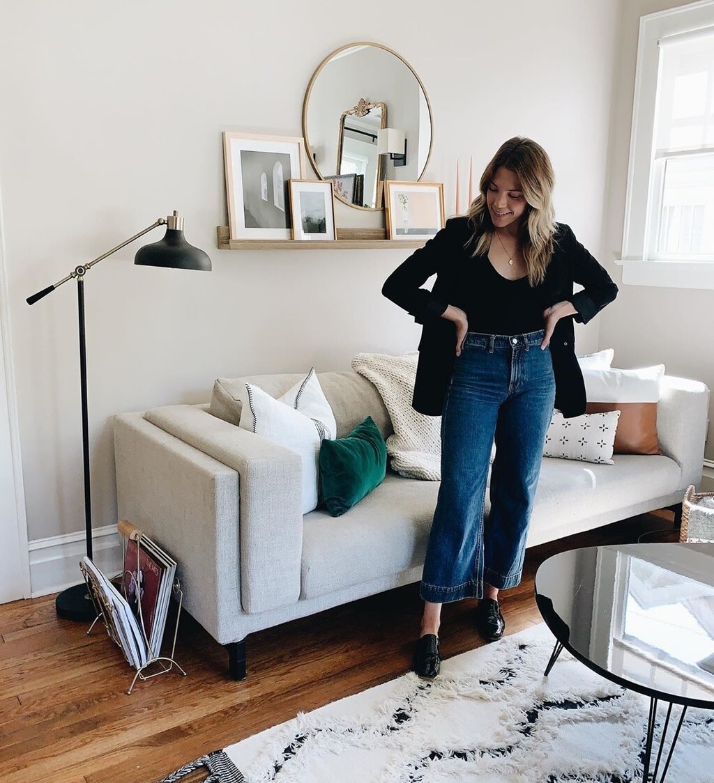 Custom framed artwork on a shelf