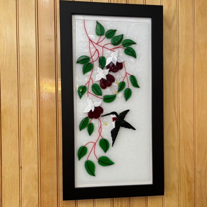 Verified review from Theresa Rehbein: "What a beautiful way to show off my fused glass artwork, I couldn’t be happier. It is extremely solid and very well made, it handles the weight of the glass without a problem. The frame is 11.5 x 24."