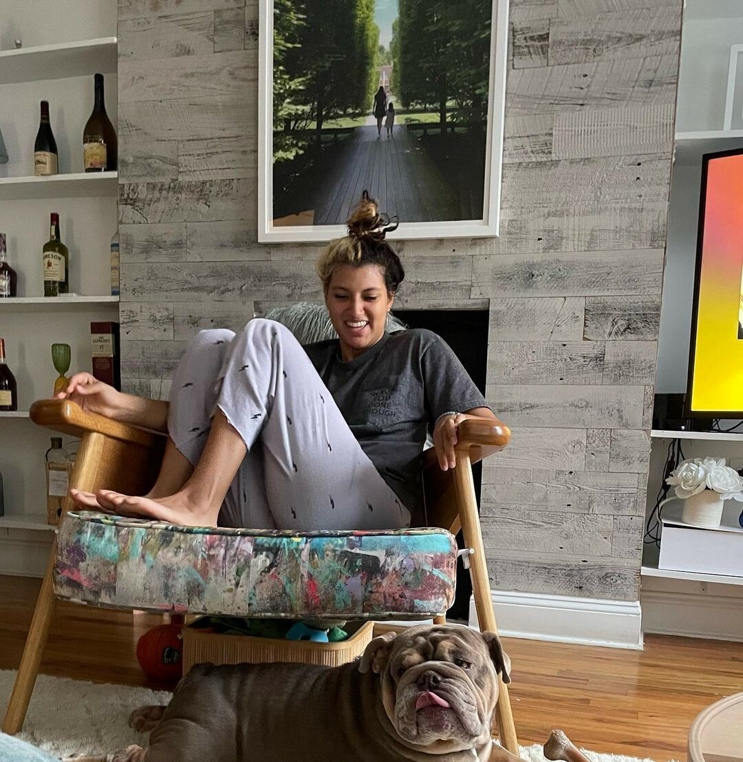 Accent wall with fireplace and framed photo