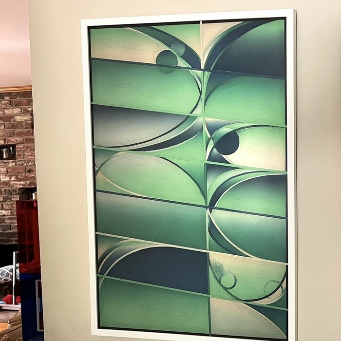 @jonaslamis: "Framed some wonderful art today using @levelframes. First a Metropolis diptych by 
@mpkoz. This is the Los Angeles City trait with a Serpent palette on Black Paper."